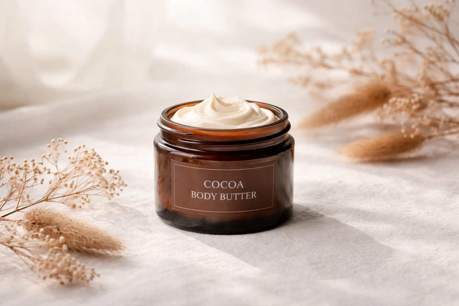 Homemade cocoa body butter recipe with coconut oil and jojoba oil for skin hydration