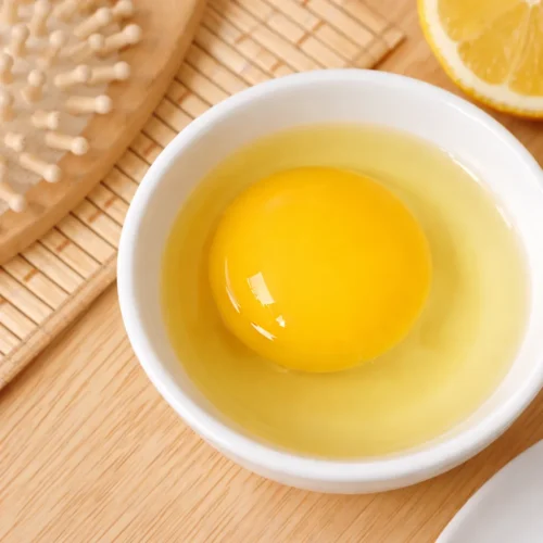 Egg hair mask for thick hair using natural ingredients for nourishment and shine.