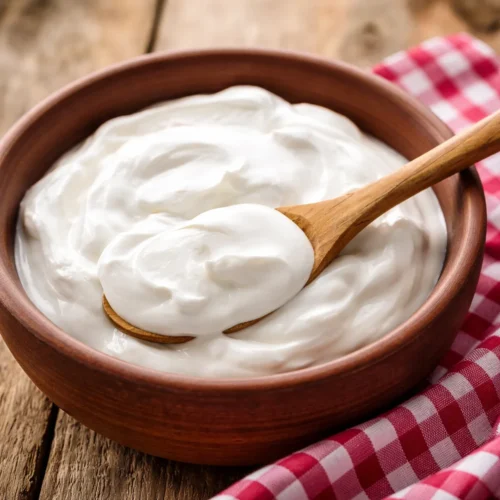 Natural yogurt hair mask for dandruff treatment and healthy scalp nourishment.