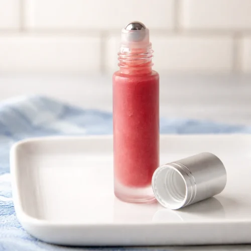 Homemade lip gloss recipe with natural ingredients for soft, glossy lips.